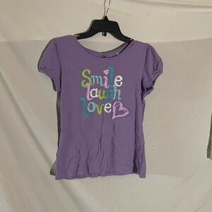 Lavender shirt with small white polka dots